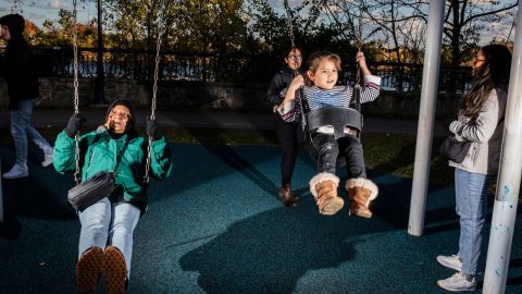 Irma Rivera, 63, swings with 5-year-old Sofia Contreras at the playground dedicated to Allison Wyatt in Norwalk, Connecticut.