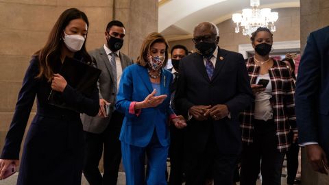 Pelosi walks with Majority Whip James Clyburn, right, who told CNN he's not interested in becoming speaker.