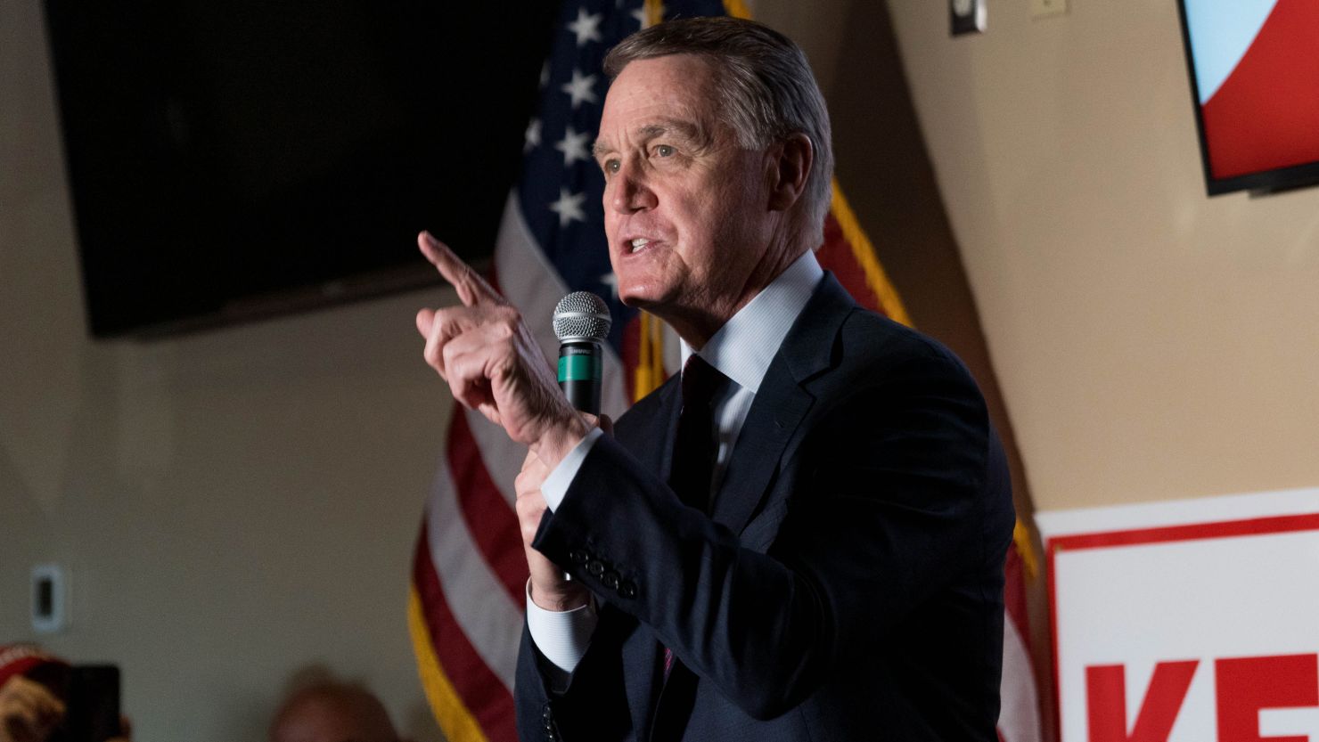 Then-US Sen David Perdue, a Georgia Republican, speaks at a campaign event to supporters at a restaurant on November 13, 2020 in Cumming, Georgia