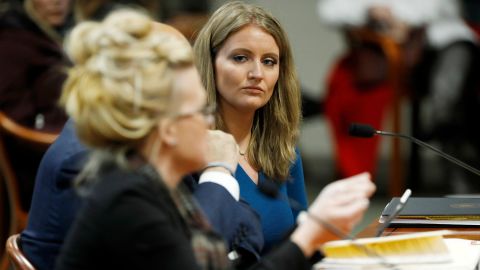 Lawyer Jenna Ellis, right, listens to Melissa Carone, who was working for Dominion Voting Services, as she speaks in front of the Michigan House Oversight Committee in Lansing, Michigan, on December 2, 2020. 