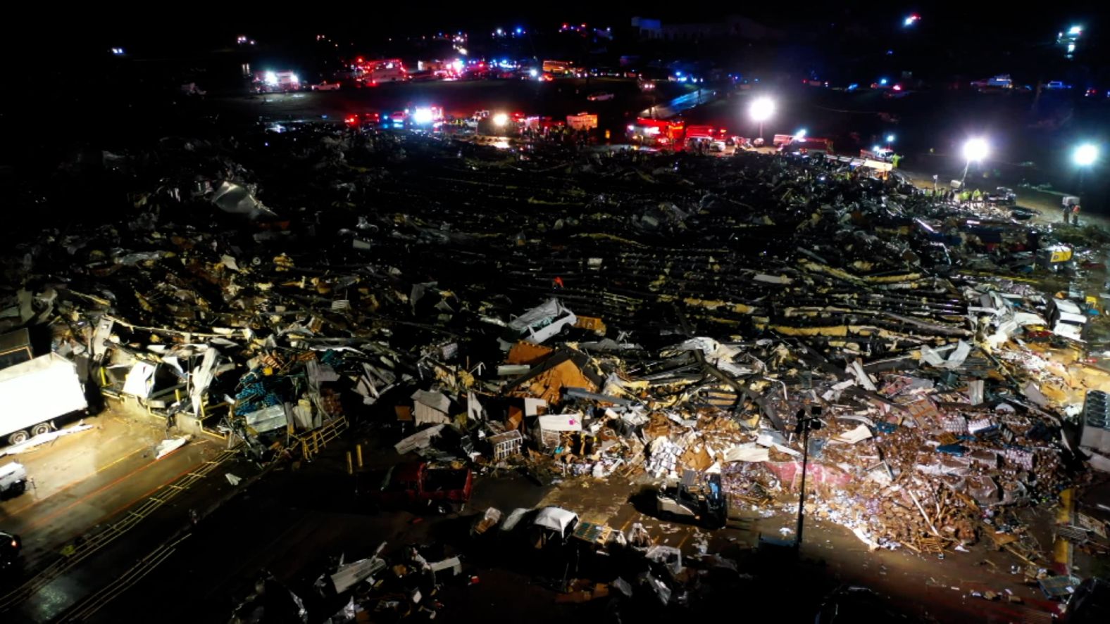 Debris and structural damage can be seen at the Mayfield Consumer Products candle factory in Mayfield early Saturday.