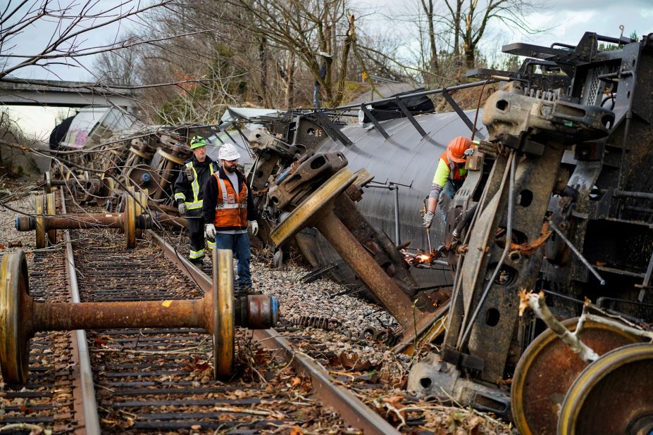 People work at the scene of a train derailment in Earlington, Kentucky.