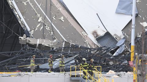 First responders survey a damaged Amazon Distribution Center on December 11, in Edwardsville, Illinois. 