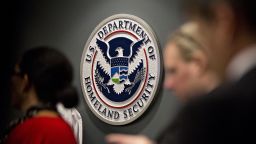 The US Department of Homeland Security seal hangs on a wall at the agency headquarters in Washington DC, on July 6, 2018.