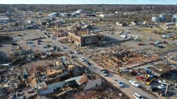 MAYFIELD, KENTUCKY - DECEMBER 11: In this aerial view, homes and businesses are destroyed after a tornado ripped through town the previous evening on December 11, 2021 in Mayfield, Kentucky. Multiple tornadoes touched down several Midwest states late evening December 11 causing widespread destruction and leaving an estimated 70-plus people dead.   (Photo by Scott Olson/Getty Images)