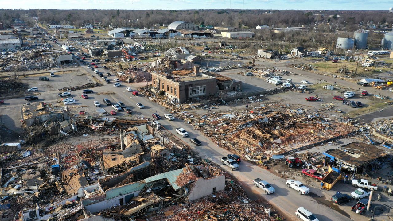 In this aerial view, homes and businesses are destroyed after a tornado ripped through town the previous evening on December 11, 2021, in Mayfield, Kentucky. 