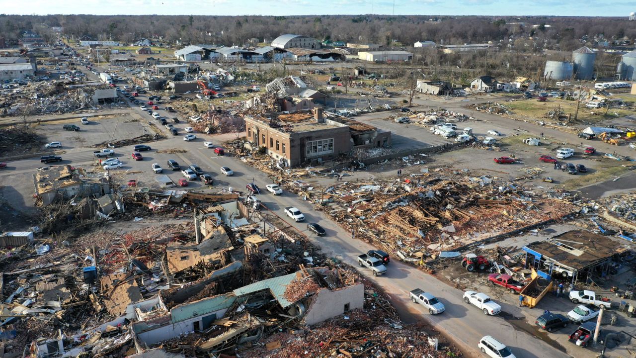 In this aerial view, homes and businesses are destroyed after a tornado ripped through town the previous evening on December 11, 2021, in Mayfield, Kentucky.