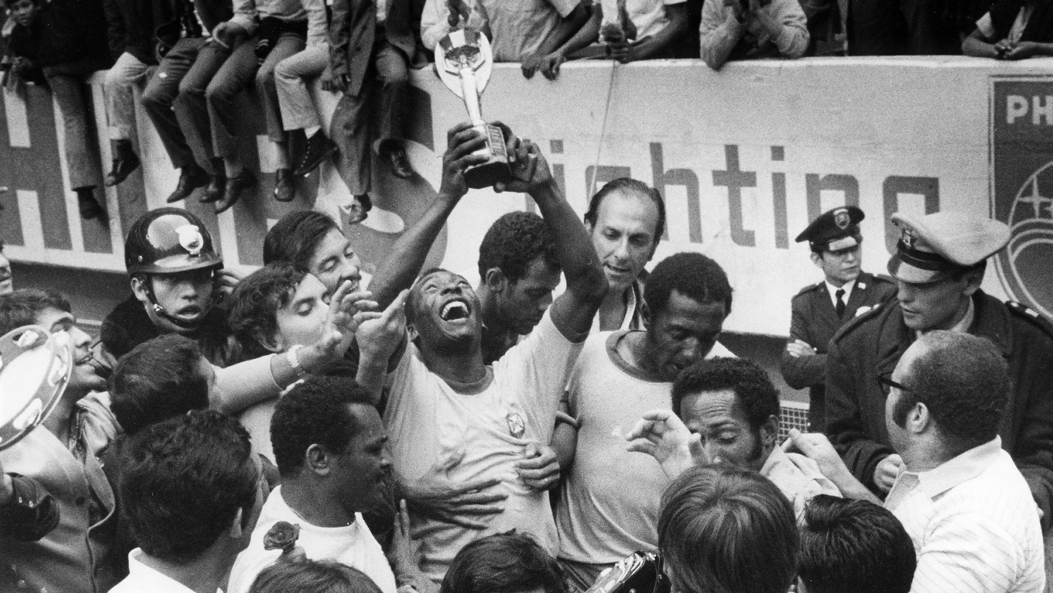 Pelé raises the Jules Rimet Trophy after winning the 1970 World Cup. Brazil was able to permanently keep that trophy for winning its third title, and a new World Cup trophy was introduced in 1974.