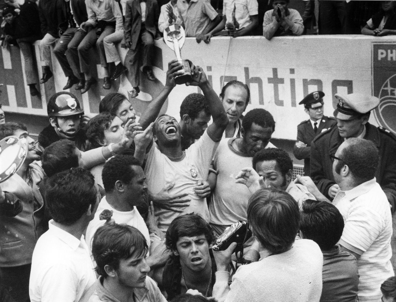 Pelé raises the Jules Rimet Trophy aft  winning the 1970 World Cup. Brazil was capable  to permanently support  that trophy for winning its 3rd  title, and a caller   World Cup trophy was introduced successful  1974.
