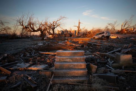 The front steps of a house are all that remain standing among storm damage in Dawson Springs on December 12.