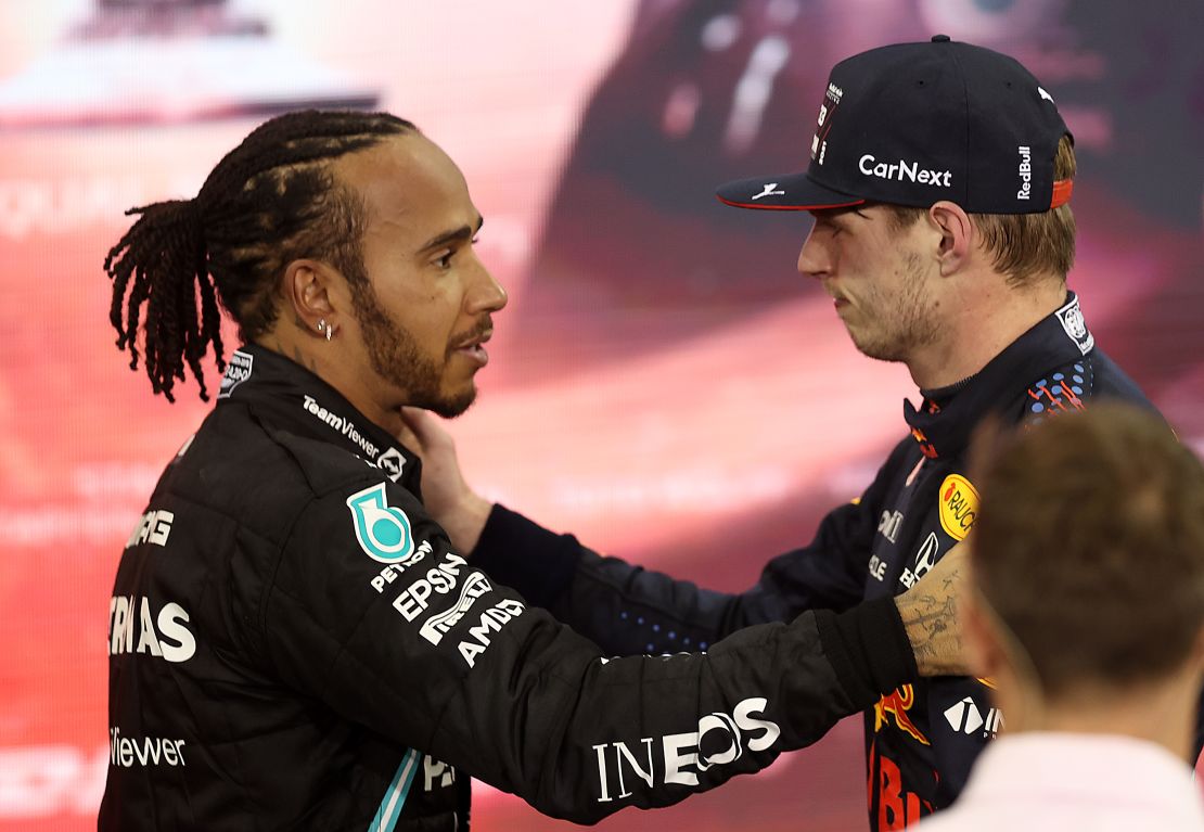 Verstappen is congratulated by Lewis Hamilton after the race. 