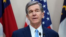 North Carolina Democratic Gov. Roy Cooper holds a news conference in the state Administration Building on Tuesday, Nov. 16, 2021 in Raleigh, N.C. Cooper announced his plan to sign the General Assembly's two-year budget bill into law when he receives it (AP Photo/Bryan Anderson)