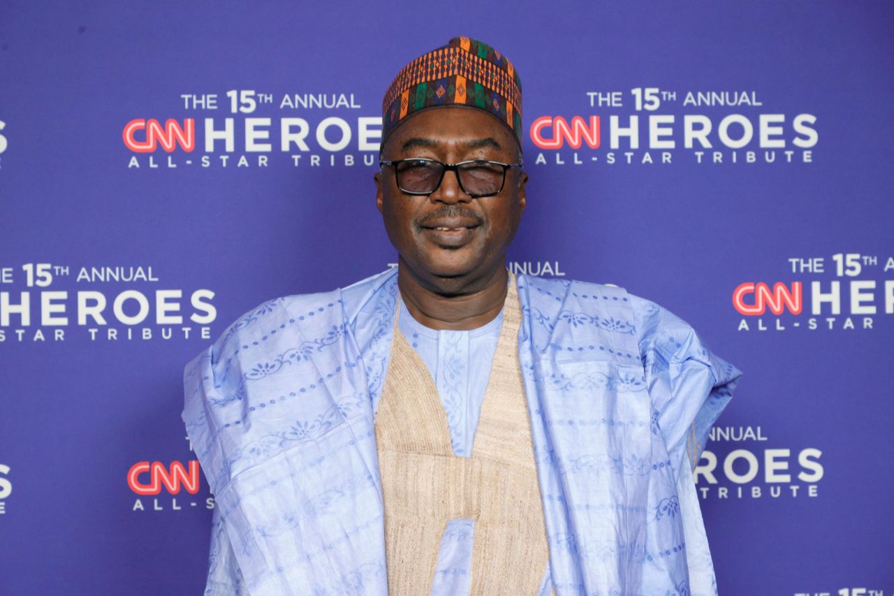 2021 <a href="https://www.cnn.com/2020/03/12/world/nigeria-boko-haram-conflict-children-school-cnnheroes/index.html" target="_blank">CNN Hero Zannah Mustapha</a> arrives on the red carpet. 