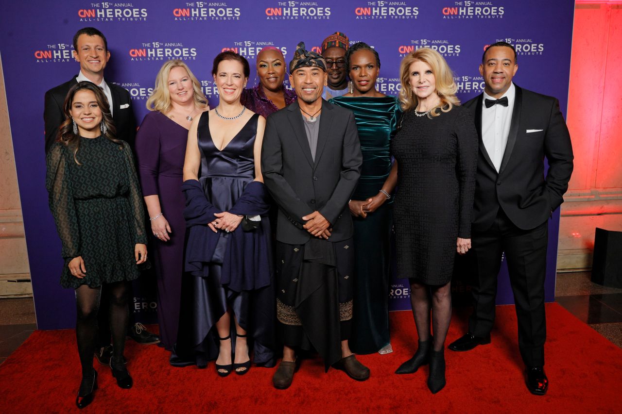 From left, David Flink, Jenifer Colpas, Lynda Doughty, Michele Neff Hernandez, Shirley Raines, Made Janur Yasa, Zannah Mustapha, Dr. Ala Stanford, Dr. Patricia Gordon, and Hector Guadalupe, the 2021 CNN Top 10 Heroes, pose together prior to the ceremony. 