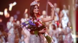 India's Harnaaz Sandhu waves after being crowned Miss Universe 2021 during the 70th Miss Universe pageant, Monday, Dec. 13, 2021, in Eilat, Israel. (AP Photo/Ariel Schalit)