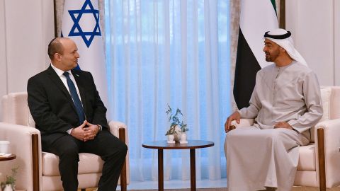 In this photo provided by the Israel Government Press Office, Israeli Prime Minister Naftali Bennett, left, meet Abu Dhabi Crown Prince Sheikh Mohammed bin Zayed at his private palace in Abu Dhabi.