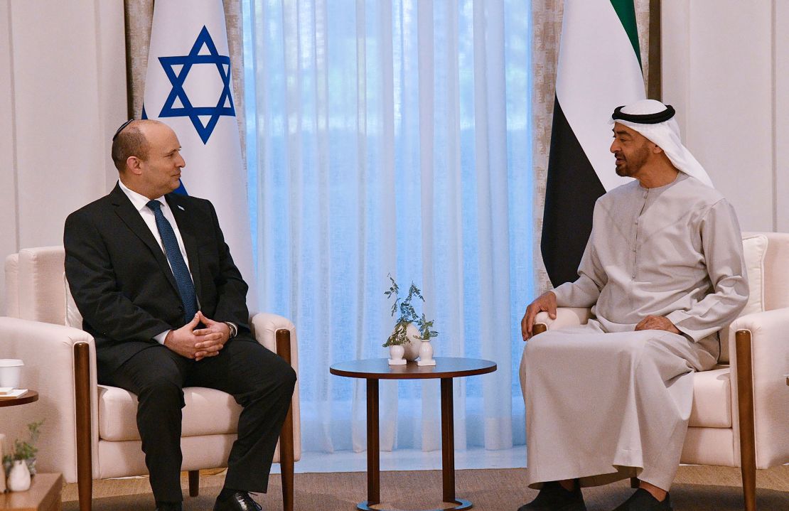 In this photo provided by the Israel Government Press Office, Israeli Prime Minister Naftali Bennett, left, meet Abu Dhabi Crown Prince Sheikh Mohammed bin Zayed at his private palace in Abu Dhabi.