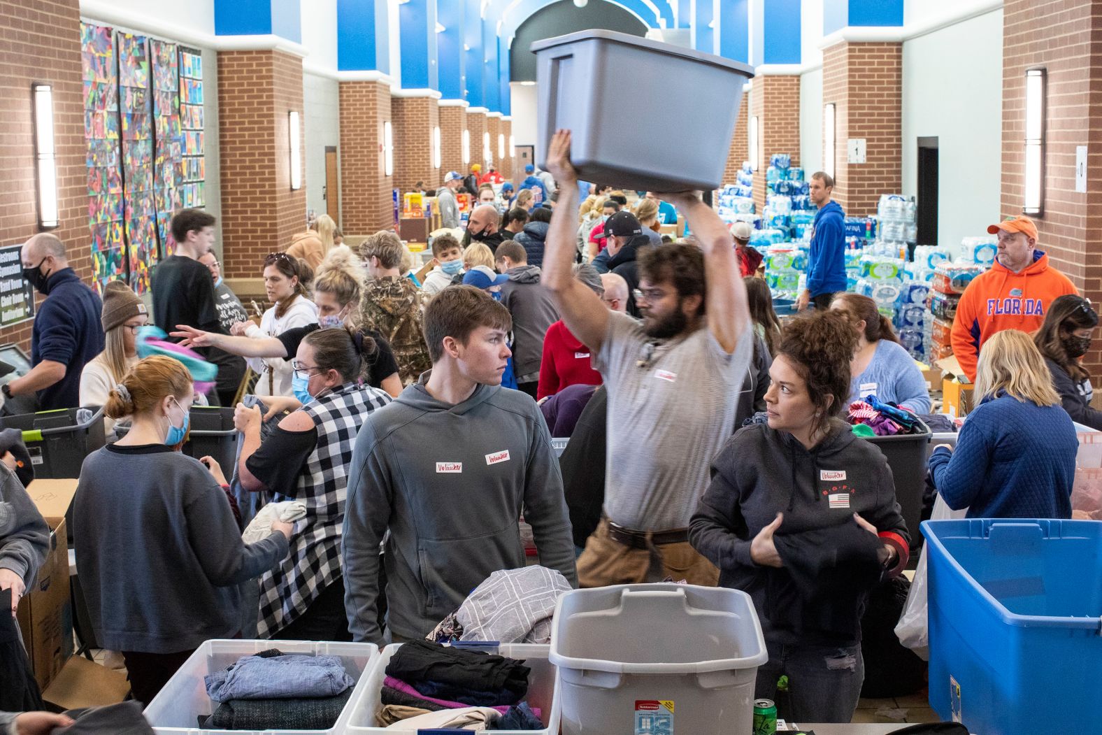 Red Cross volunteers sort donations at South Warren High School in Bowling Green, Kentucky, on December 12 for people affected by tornadoes.