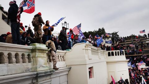 Donald Trump supporters storm the US Capitol following a "Stop the Steal" rally on January 6, 2021, in Washington. 