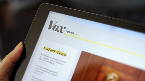 Vox website is displayed on an iPad. 