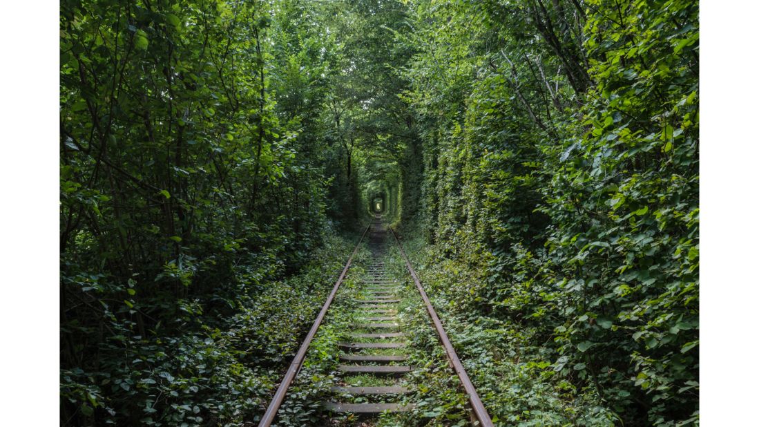 <strong>Natural tunnel: </strong>Tunnel of Love, a disused section of industrial railway situated near Klevan in Ukraine, was originally planted to conceal a military base during the Cold War. It's since become a popular tourist spot and is also favored by couples taking romantic walks.<br />