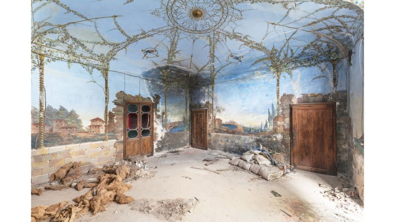 <strong>Forgotten rooms: </strong>The photographer was able to capture the beautifully painted walls and frescoes on display at this crumbling villa in Tuscany.