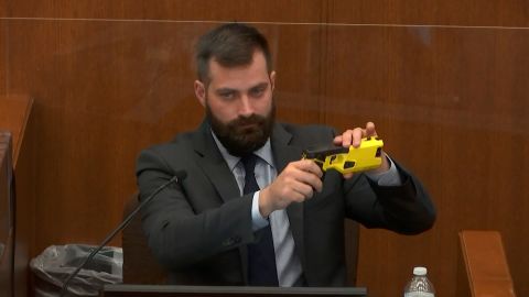 Special agent Sam McGinnis of the Minnesota Bureau of Criminal Apprehension explains the differences between Kim Potter's service weapon and a Taser.