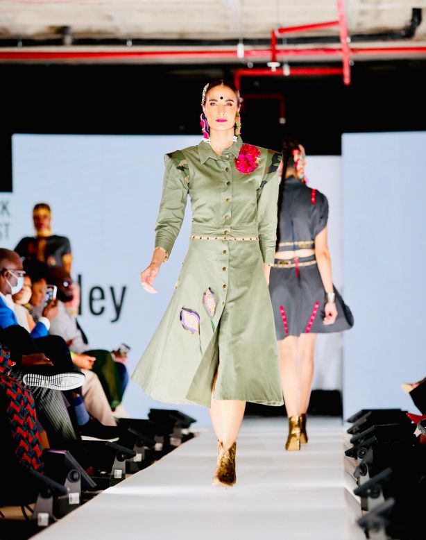 Moodley designed this coat to be multi-functional. It converts to a dress, separates into a skirt and jacket, and also features removable sleeves. 