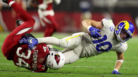 Kupp is tackled by Jalen Thompson of the Arizona Cardinals.
