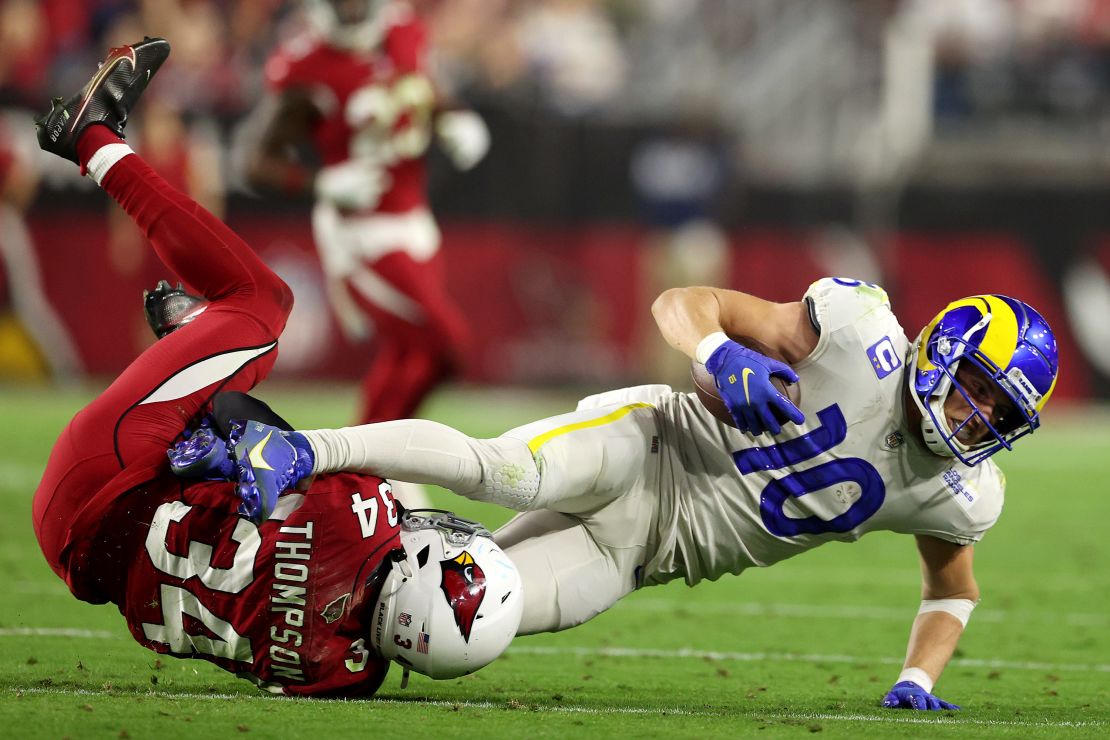 Kupp is tackled by Jalen Thompson of the Arizona Cardinals.