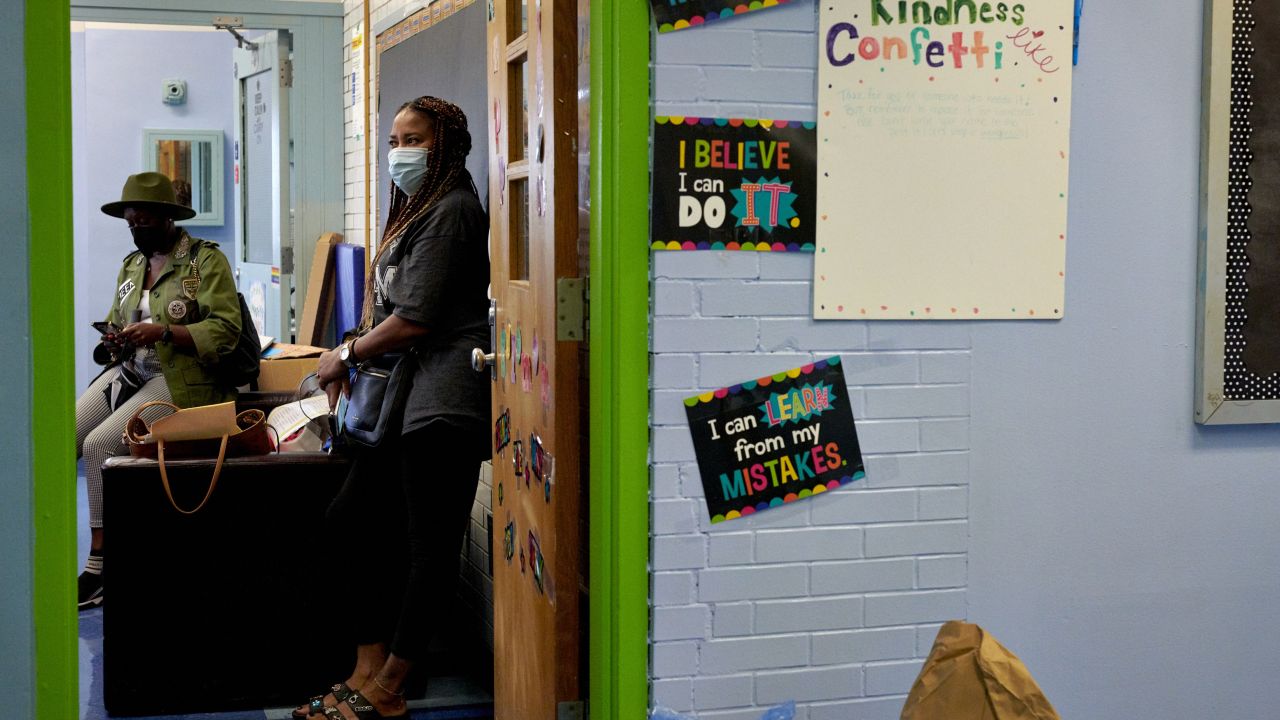 Staff at Brooklyn Science & Engineering Academy prepare for the reopening of school in New York City in September 2021.