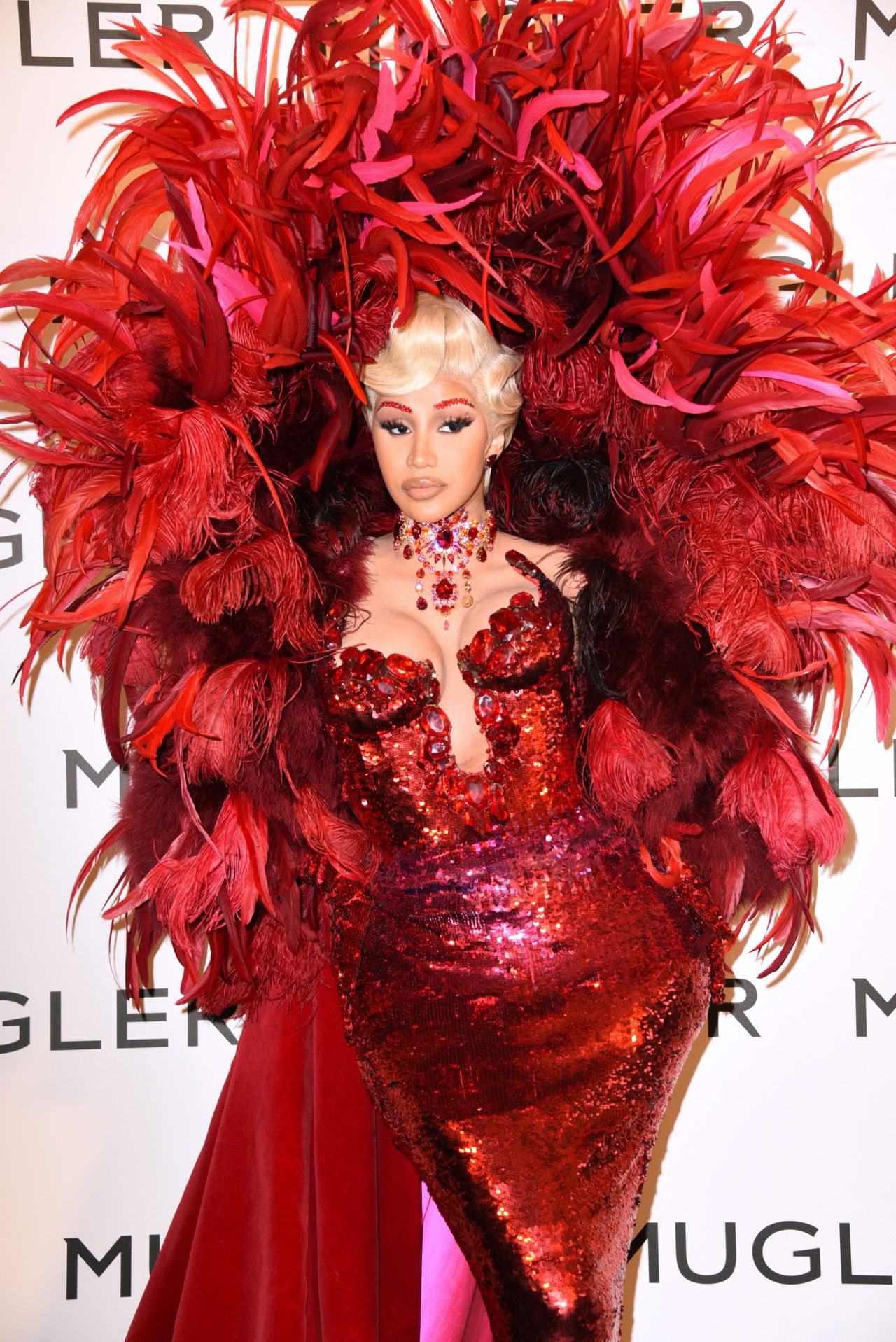 For the opening of the 'Thierry Mugler: Couturissime' exhibition at the Museum of Fine Arts in Paris, Cardi B dazzled in a vintage Mugler look.