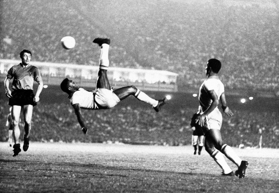 Pelé performs an overhead kick during a match in 1965. Dutch soccer star Johan Cruyff once said Pelé "was the only footballer who surpassed the boundaries of logic."