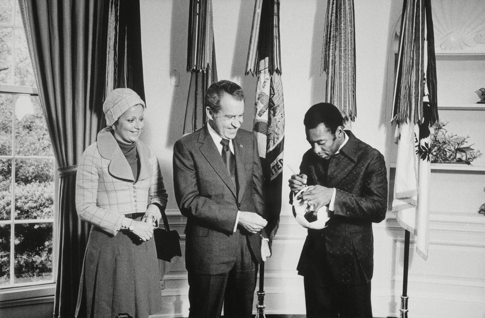 Pelé signs a soccer ball for US President Richard Nixon while visiting the White House with his wife, Rosemeri, in 1973. Pelé met several US presidents during his life. His celebrity status brought this famous quip from Ronald Reagan in 1986: "My name is Ronald Reagan, I'm the President of the United States of America. But you don't need to introduce yourself, because everyone knows who Pelé is."
