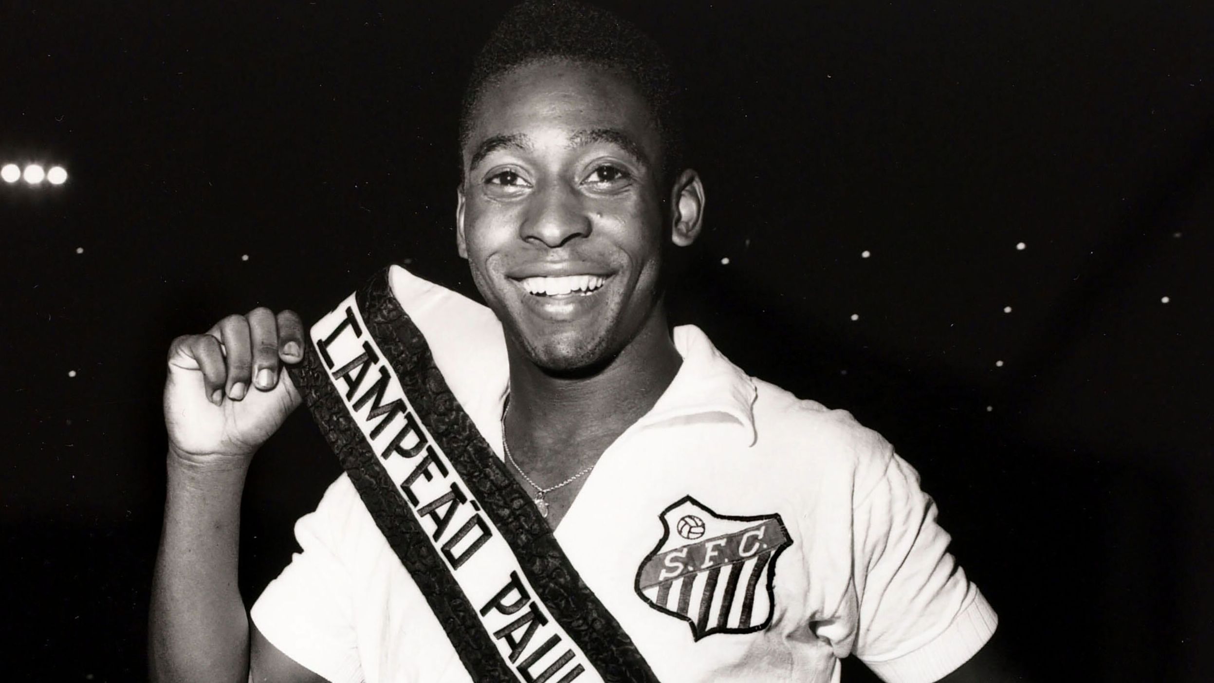 Pelé wears a sash after Santos became São Paulo state champions in 1961. Pelé played for the club from 1956-1974, scoring 618 goals and winning six Brazilian league titles. In 1962 and 1963, Santos won the Copa Libertadores, which is South America's premier club competition.