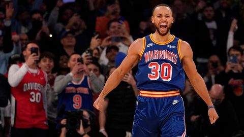 Steph Curry reacts after making a three-pointer against the New York Knicks on Tuesday.