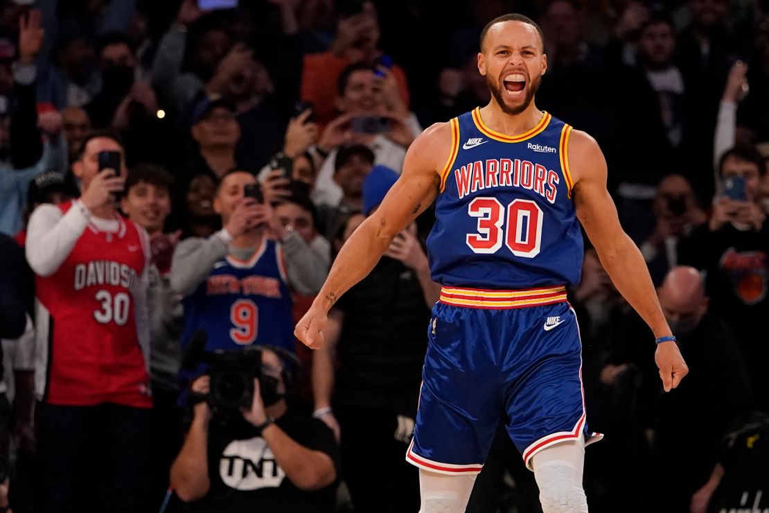 Steph Curry reacts after making a three-pointer against the New York Knicks on Tuesday.