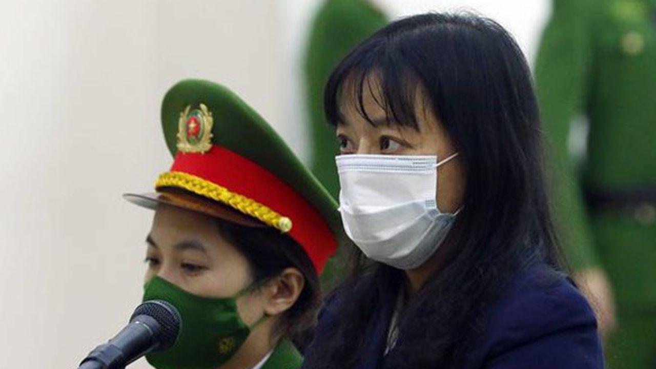 Journalist Pham Doan Trang stands trial at Hanoi People's Court on December 14.