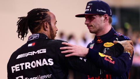 Verstappen is congratulated by Hamilton following his dramatic victory.