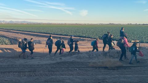 Migrants who have just crossed the border, walking into Yuma.