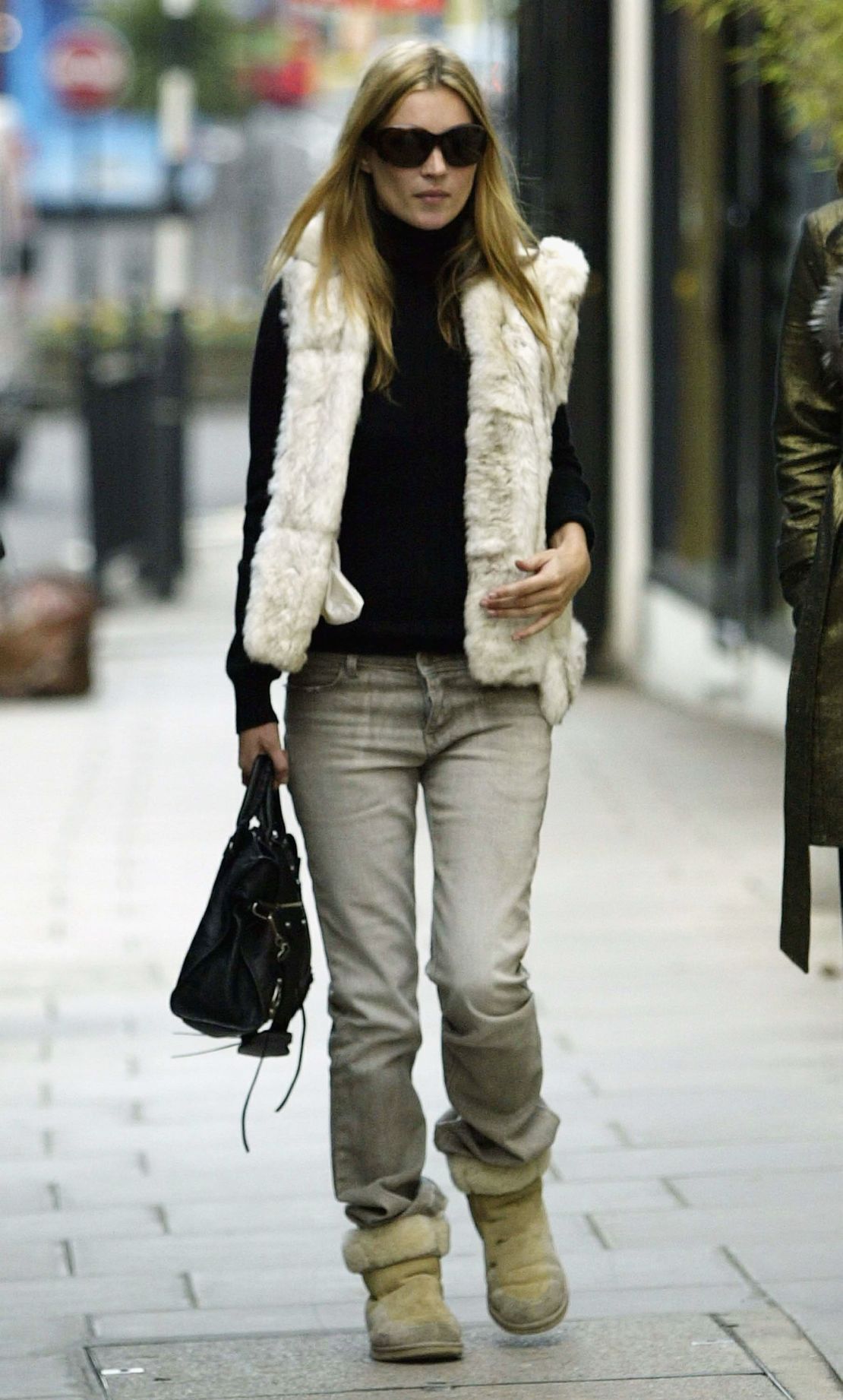 Kate Moss wears Uggs on a walk around West London, 2003.
