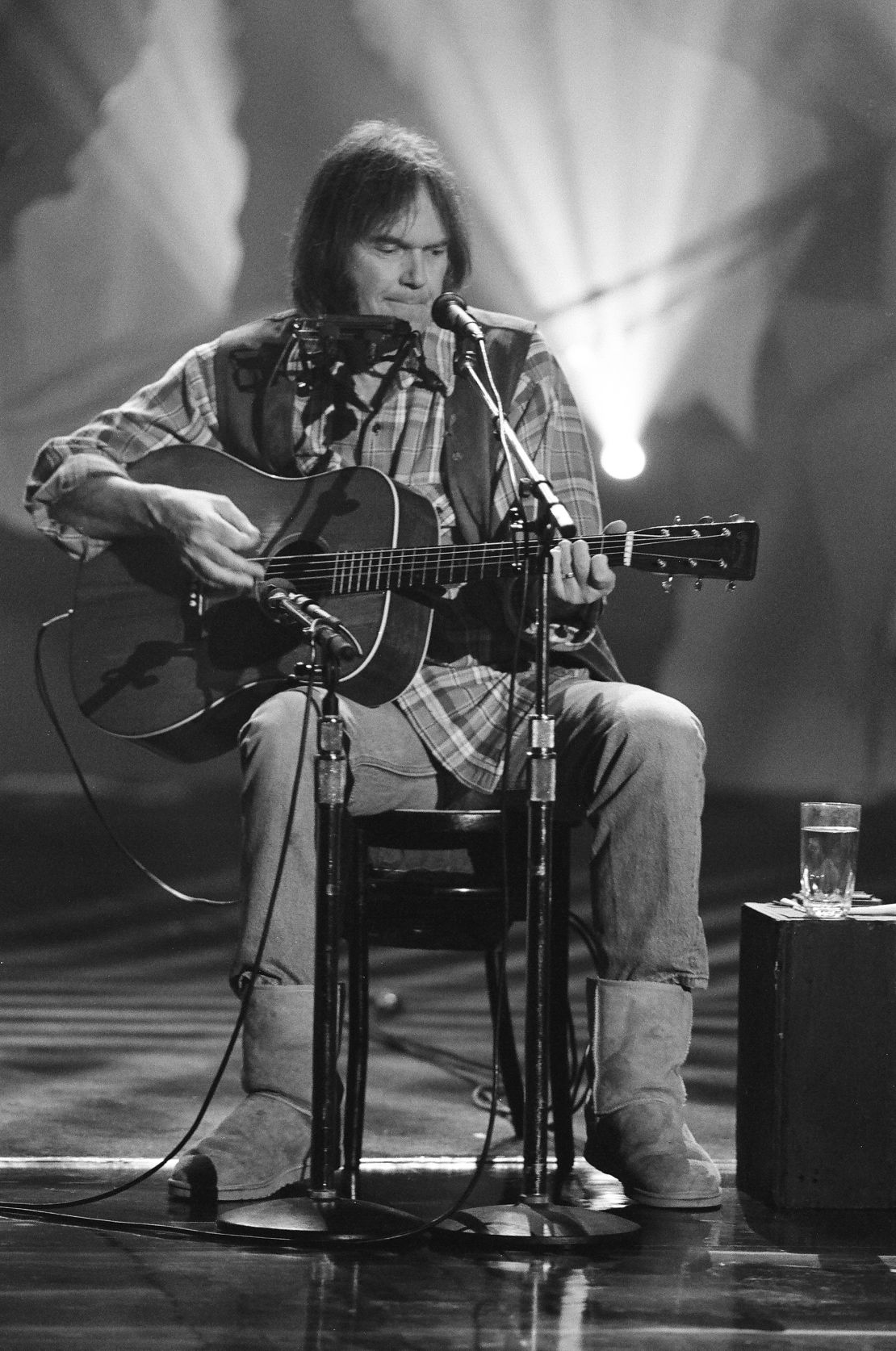 Neil Young performs on The Tonight Show with Jay Leno in 1993 wearing a pair of Uggs gifted to him by founder Brian Smith.