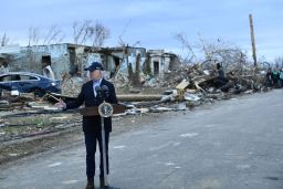 US President Joe Biden speaks after touring storm damage in Dawson Springs, Kentucky, on December 15, 2021. - Biden will tour areas devastated by the December 10-11 tornadoes. 