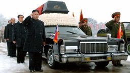 PYONGYANG, North Korea - Kim Jong Un (L front), son of the late North Korean leader Kim Jong Il and his successor, salutes beside the hearse carrying the coffin of the elder Kim in Pyongyang on Dec. 28, 2011. The younger Kim's uncle and presumed guardian Jang Song Thaek (behind Kim Jong Un), a vice chairman of the National Defense Commission, and Ri Yong Ho (R), chief of the General Staff of the Korean People's Army, are also in the photo. (Photo by Kyodo News Stills via Getty Images)