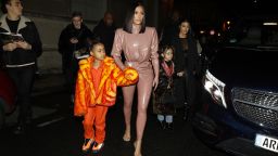 Kourtney Kardashian, daughter Penelope Disick, Kim Kardashian and daughter North West arrive at the Ferdi restaurant on March 1, 2020 in Paris, France.