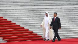 Abu Dhabi's Crown Prince, Sheikh Mohammed bin Zayed Al Nahyan walks with Chinese President Xi Jinping as they arrive for a welcome ceremony at the Great Hall of the People in Beijing, Monday, July 22, 2019.