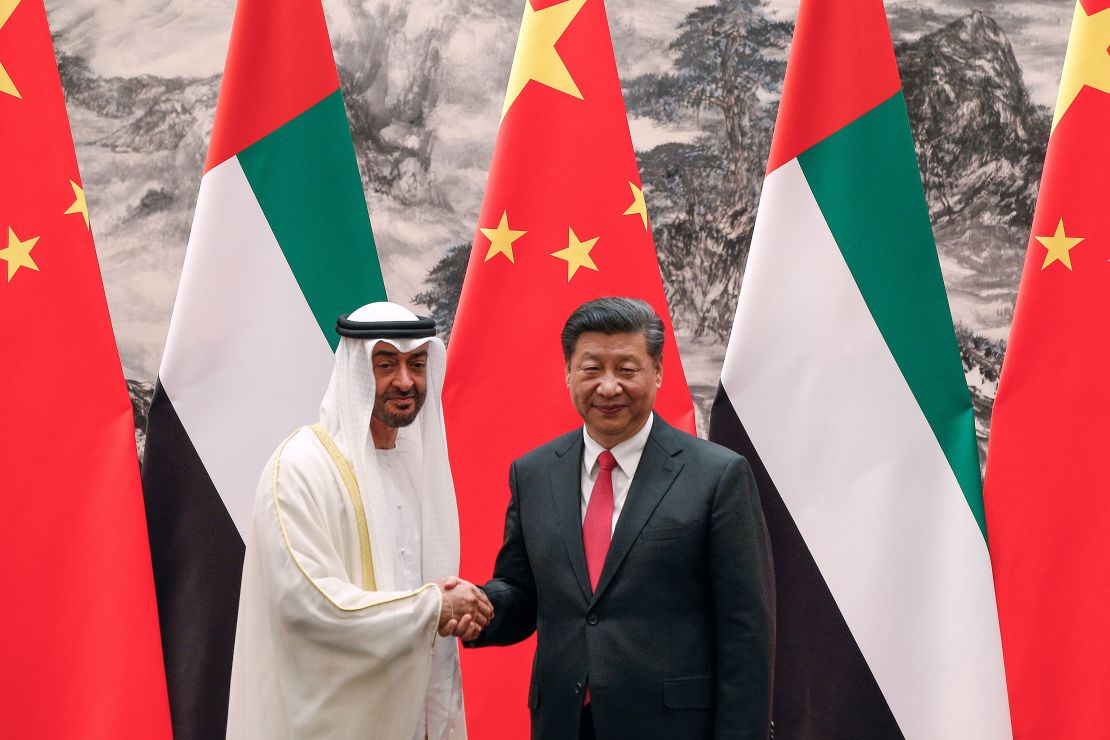 Abu Dhabi's Crown Prince Mohammed bin Zayed shakes hands with Chinese President Xi Jinping after witnessed a signing ceremony at the Great Hall of the People in Beijing on July 22, 2019. 