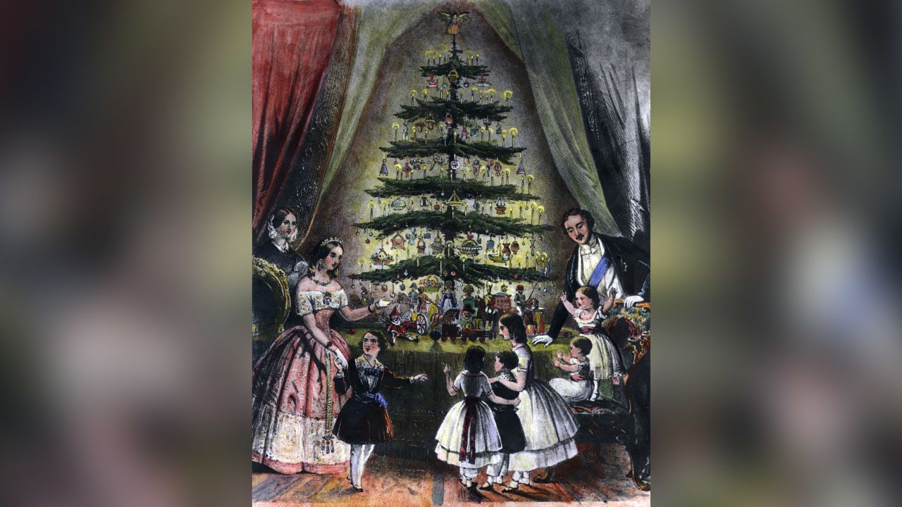 December 1848:  The Royal Christmas tree is admired by Queen Victoria, Prince Albert and their children. 