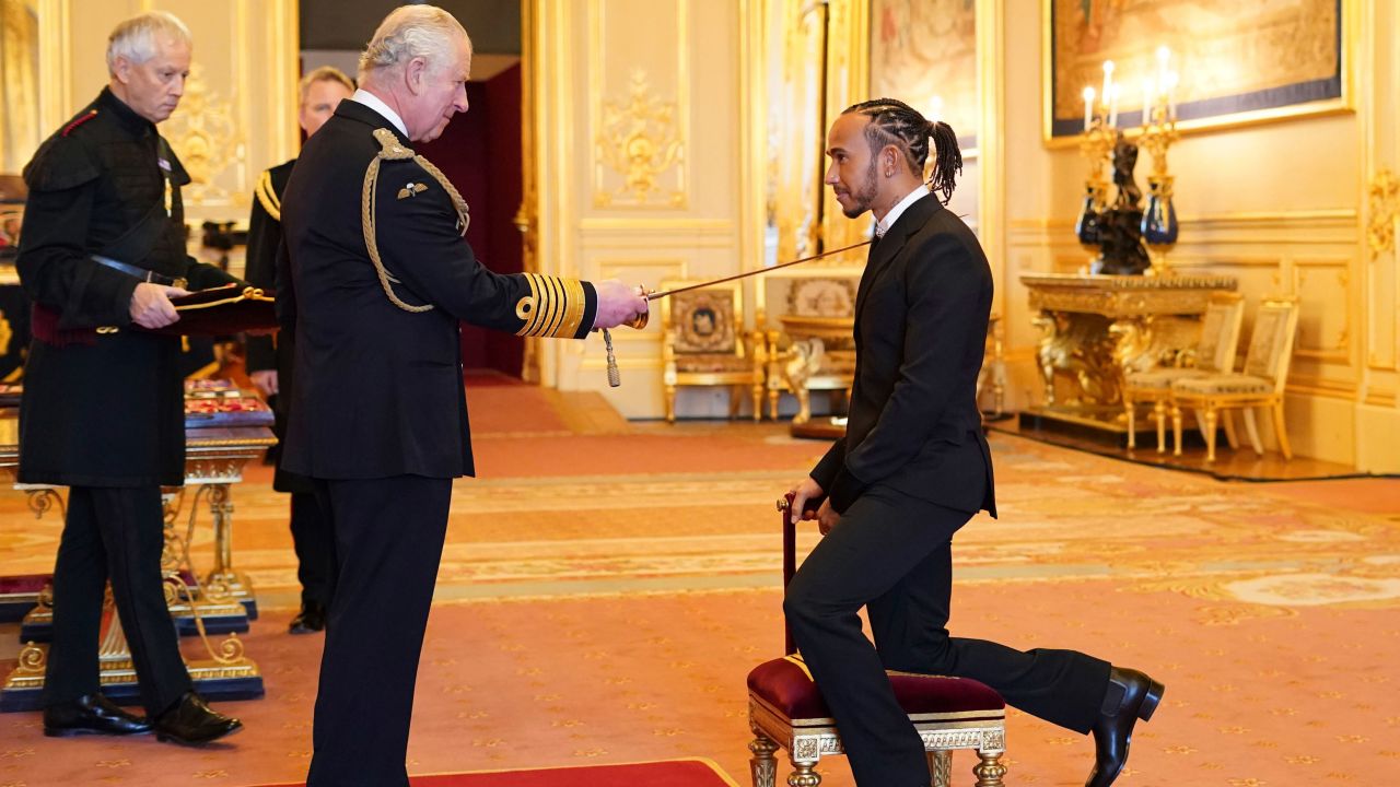 Lewis Hamilton is made a Knight Bachelor by Prince Charles.