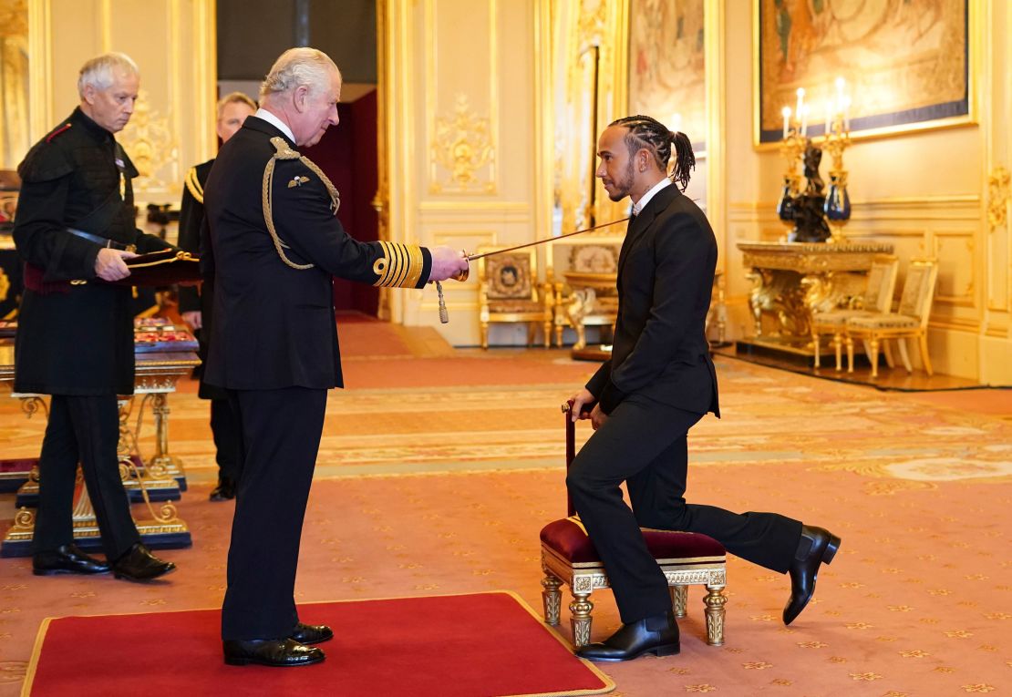 Lewis Hamilton is made a Knight Bachelor by Prince Charles.